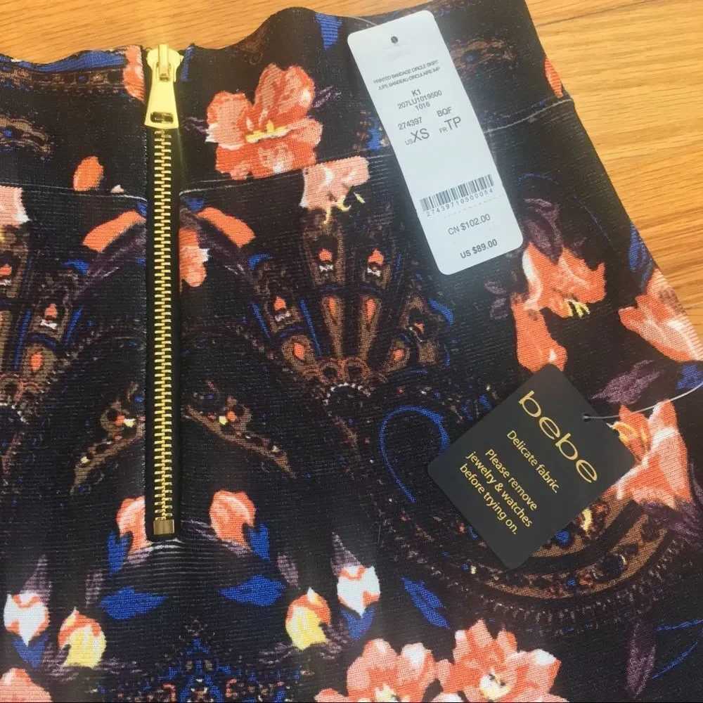 — BEBE — NWT gorgeous floral printed bandage skirt